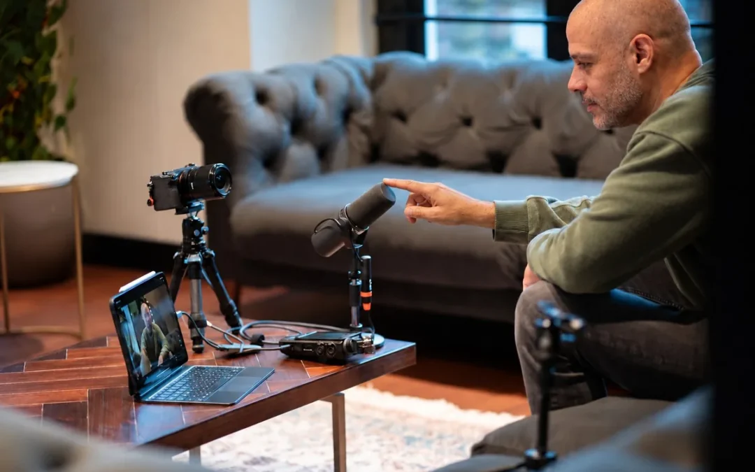 Creator with a shaved head and salt-and-pepper beard recording a product review at home